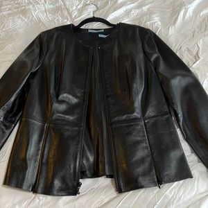 Leather jacket with matching leather sleeveless top.